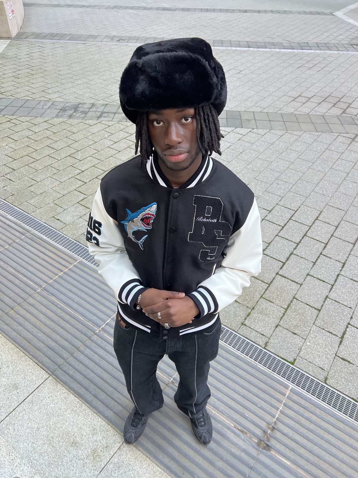 Take What's Yours, shark varsity and fur ushanka